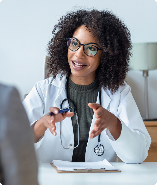 Health care provider talking to patient