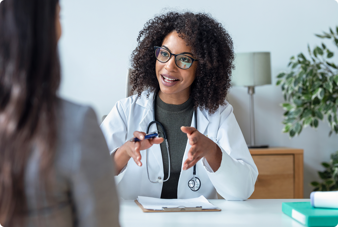 Health care provider talking to patient